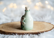 Load image into Gallery viewer, Deck the Halls potion bottle