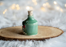 Load image into Gallery viewer, Holly Jolly in a bottle