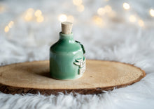 Load image into Gallery viewer, Holly Jolly in a bottle